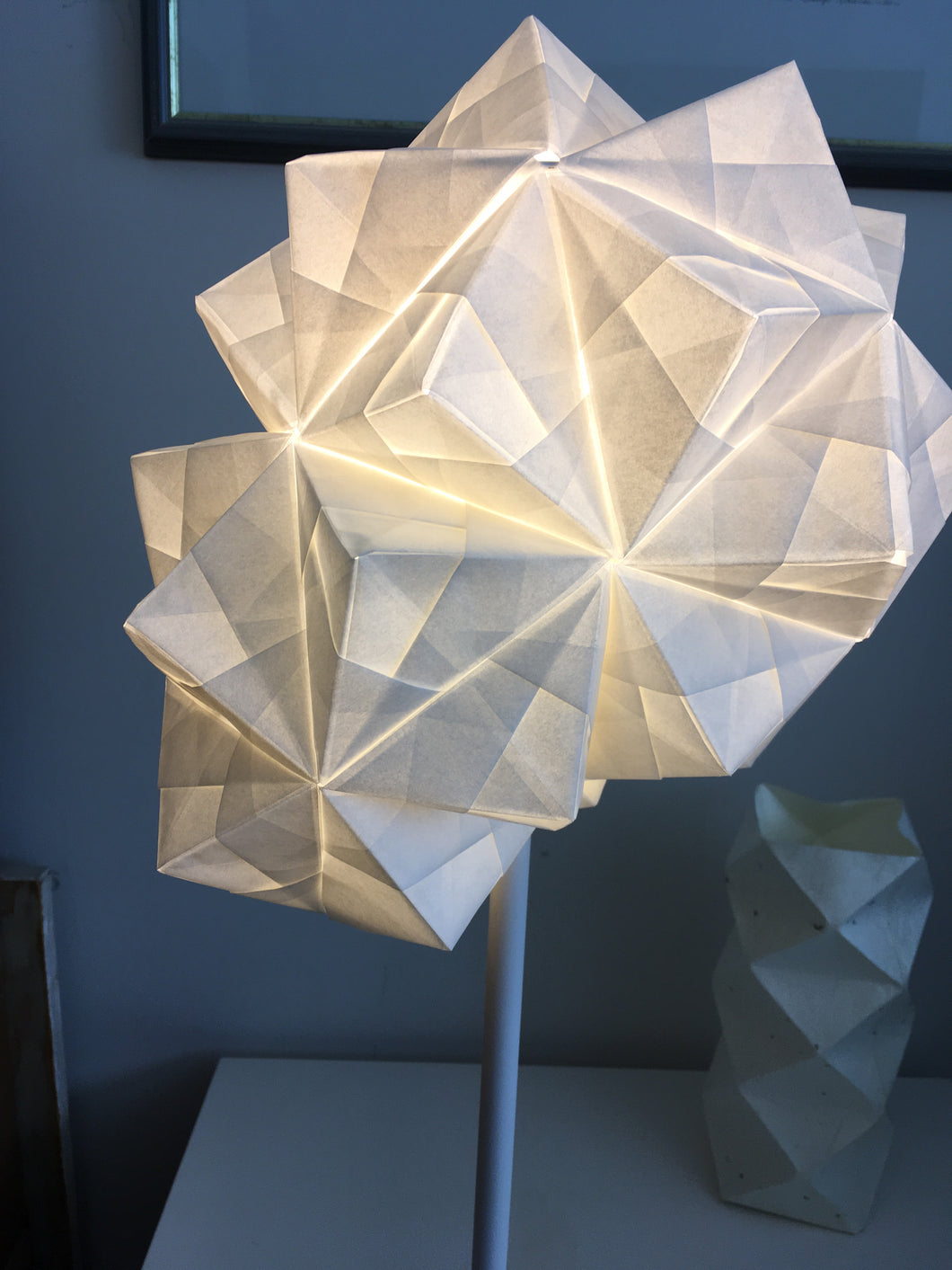 Modular Origami Table Lamp lit at night